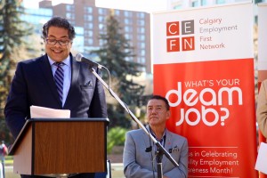 Mayor Nenshi addresses the crowd while Tom Jackson listens.