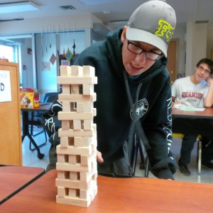 PACE client Roderick carefully chooses a Table Topic.