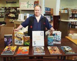 Stephen Whiteside shows off his selections for Chapter's "Staff Picks" table.